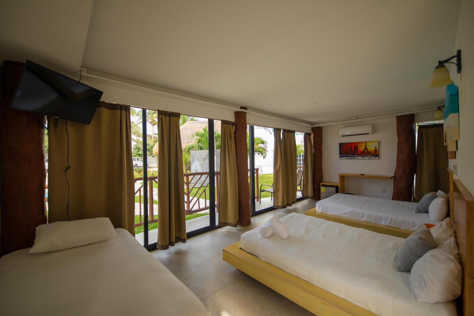 Kabanas & Beach Club Ojo De Agua Puerto Morelos Exterior photo